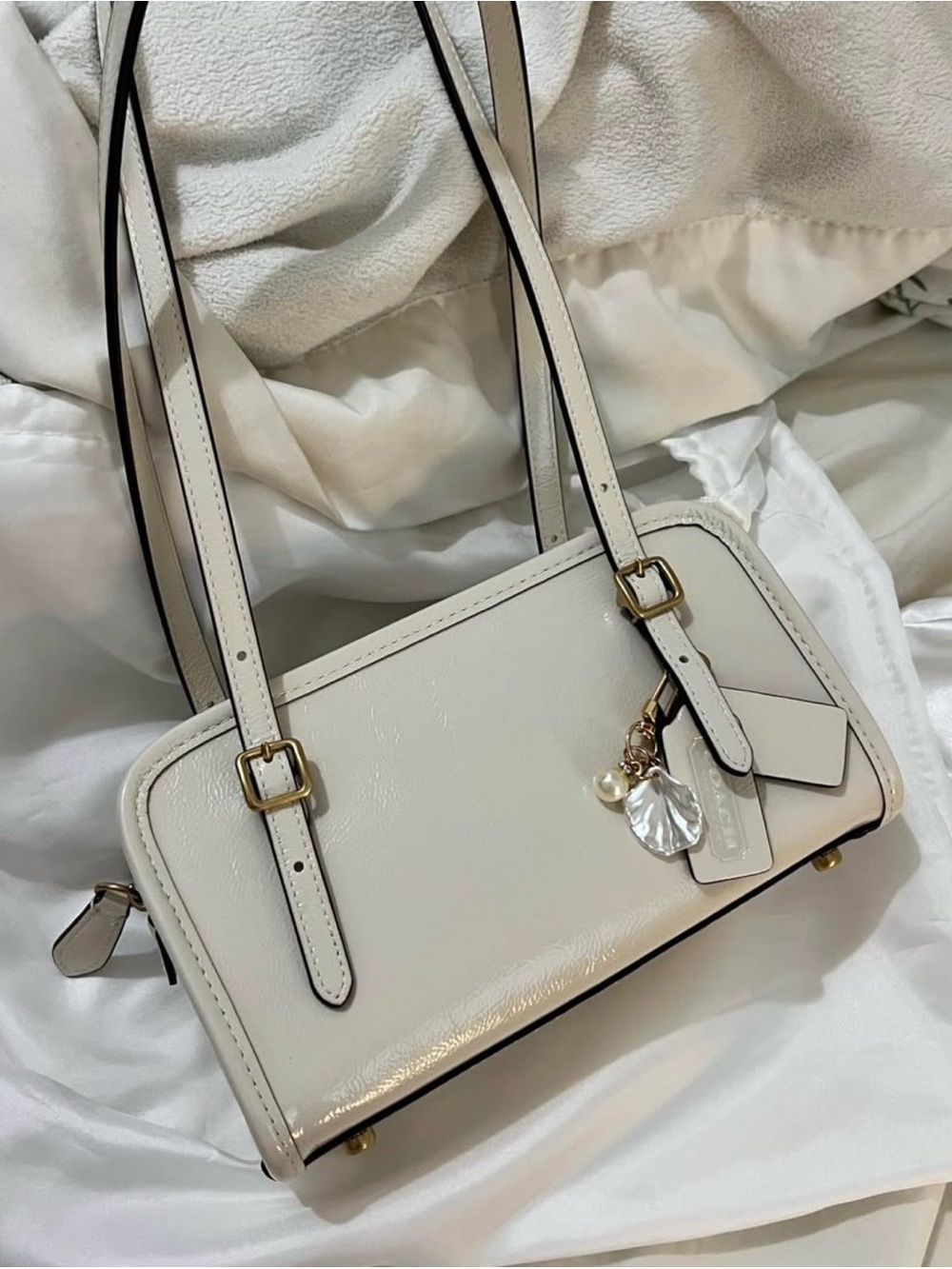 Coach Swing Zip 20 patent